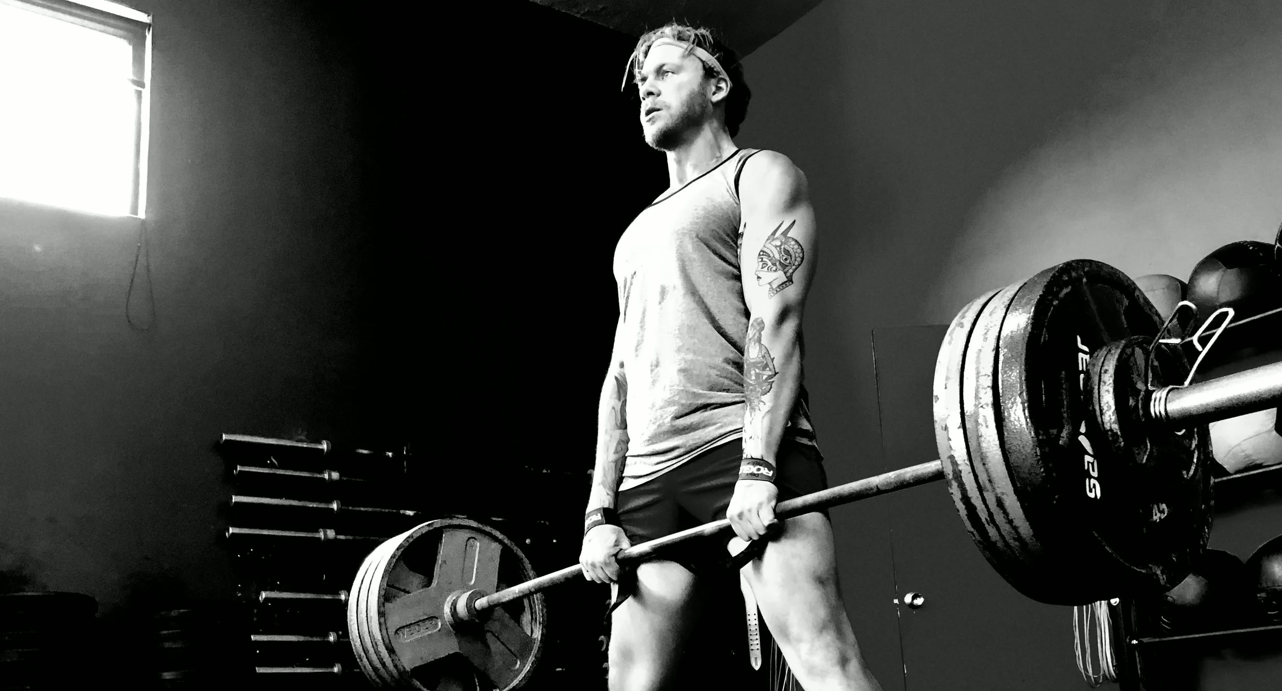 Client lifting weights during a training session