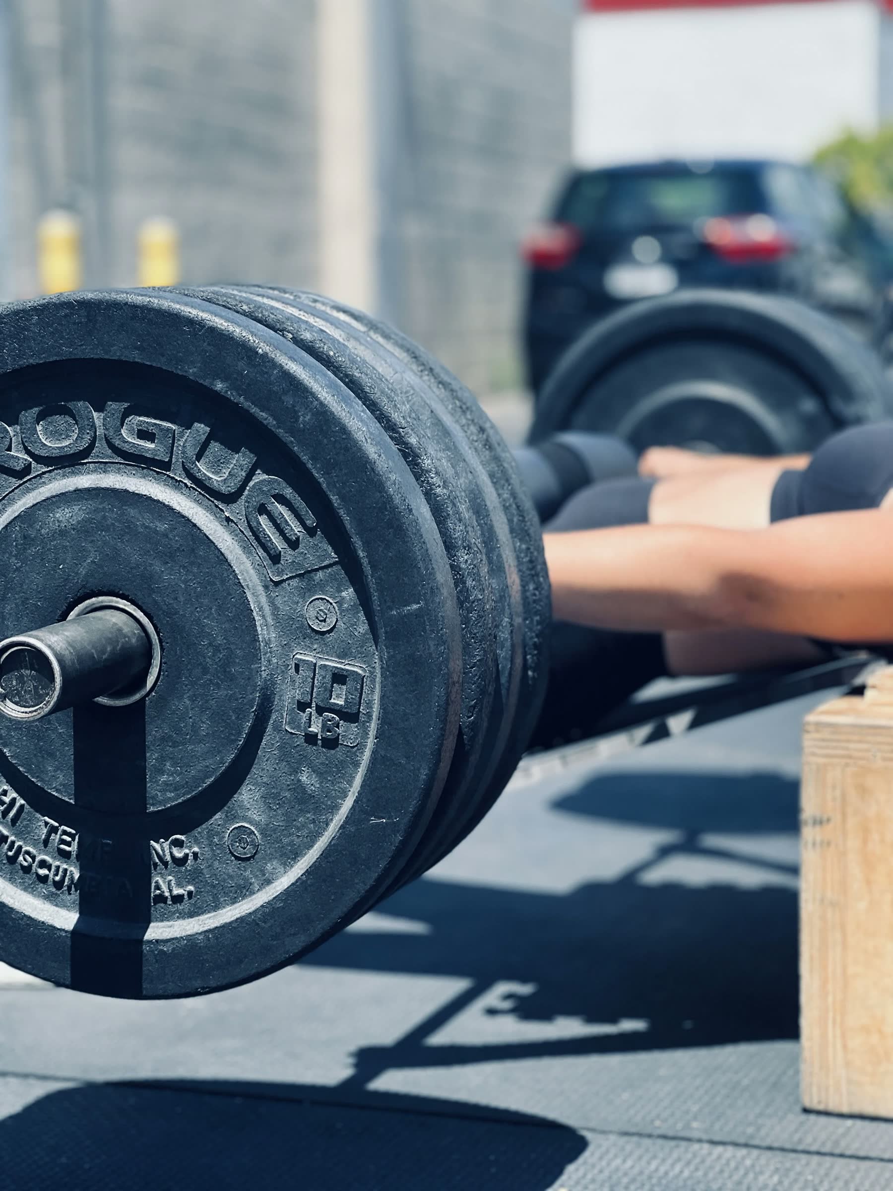 Loaded barbell on a lifting platform